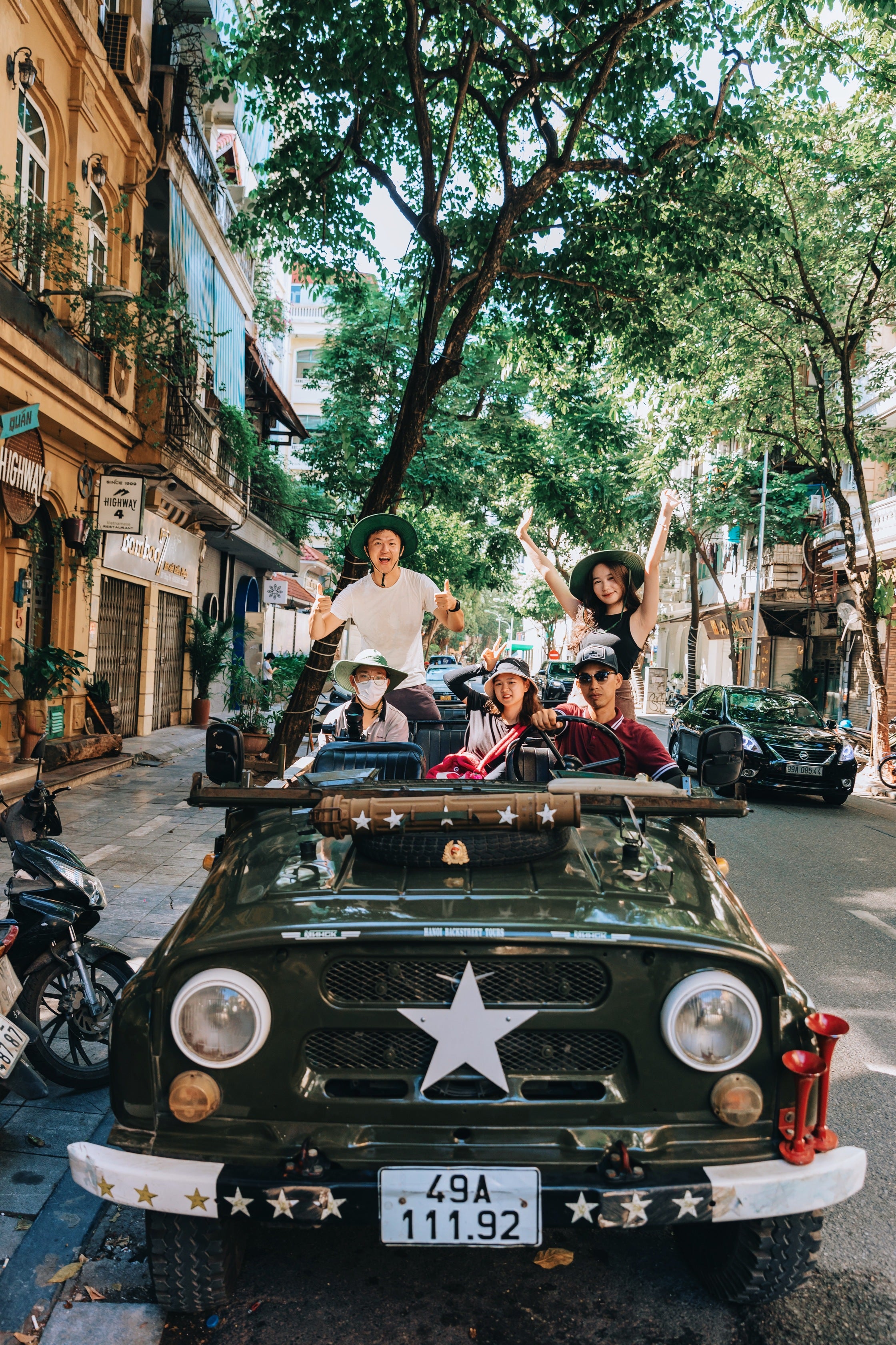 North_Vietnam_Hanoi_Jeep_On_Side_Of_Old_Street_Front.jpg