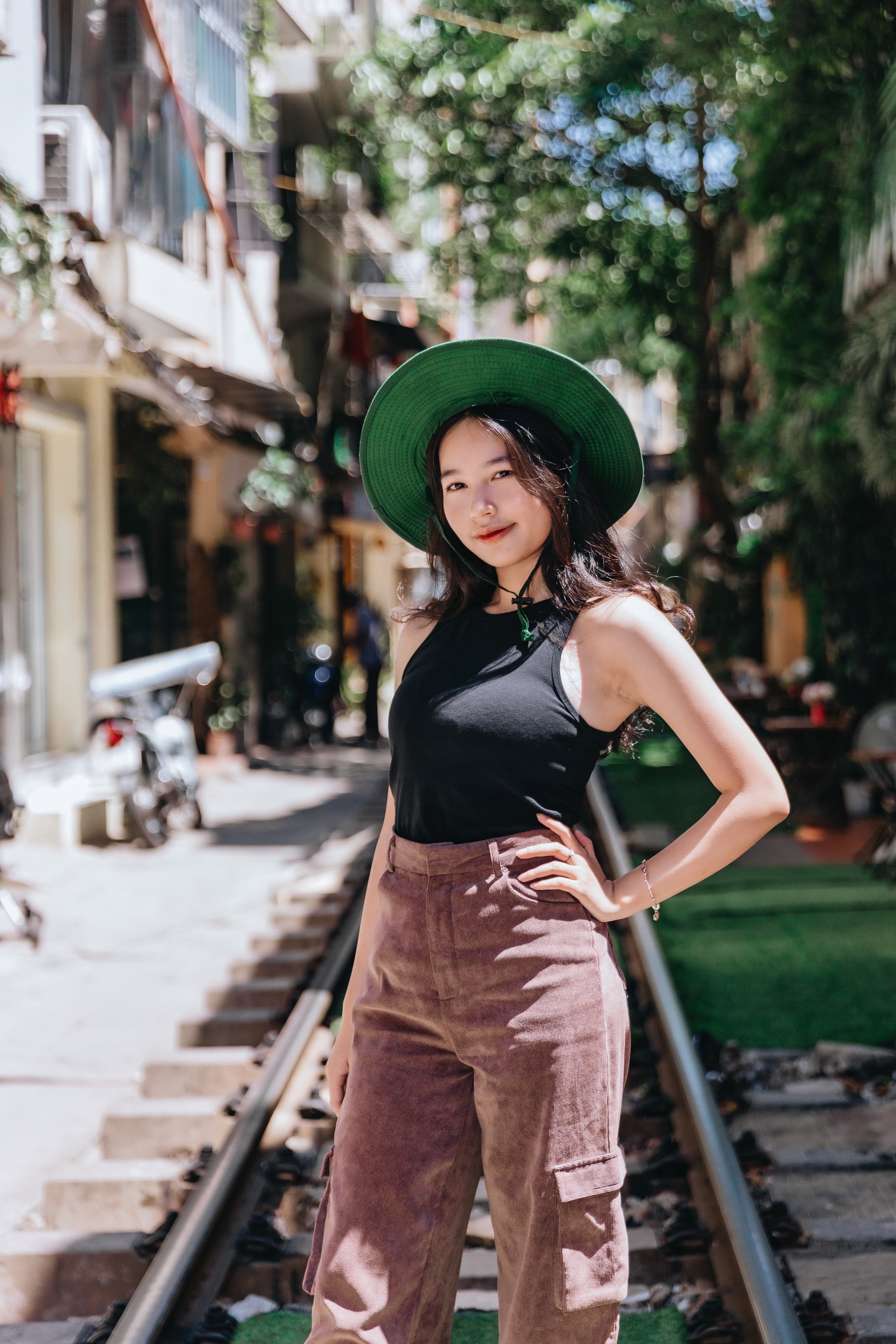 North_Vietnam_Hanoi_Thao_Posing_On_Train_Street.jpg